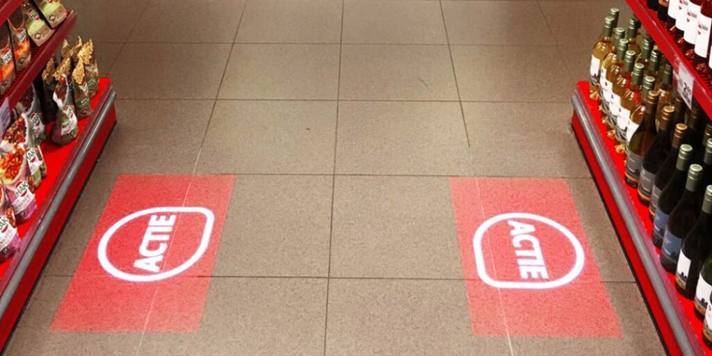 трафаретна гобо проекція мерчендайзинг трц логотип на підлозі